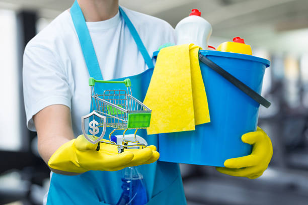 A professional cleaner from Tidy Cleaning Champs deep cleaning a bathroom using specialized brushes and eco-friendly products.